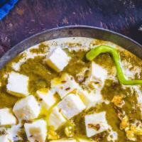 Palak Paneer · Creamy Spinach with Home made Cottage Cheese Comes With Aromatic Basmati Rice.