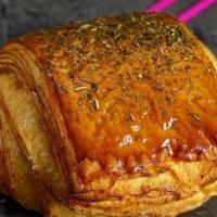 Ham And Cheese Croissant · Croissant dough rolled around ham and swiss cheese, sprinkled with herbs. 
Contains: Wheat, ...