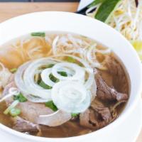Deluxe Rare Steak Pho · Beef broth. Rare steak, well done flank, fat brisket, tendon, and tripe. Steak is packaged r...