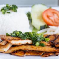 Grilled Chicken Rice Platter · White meat chicken. Served with pickled carrots and daikon, tomato, cucumber, and garnished ...