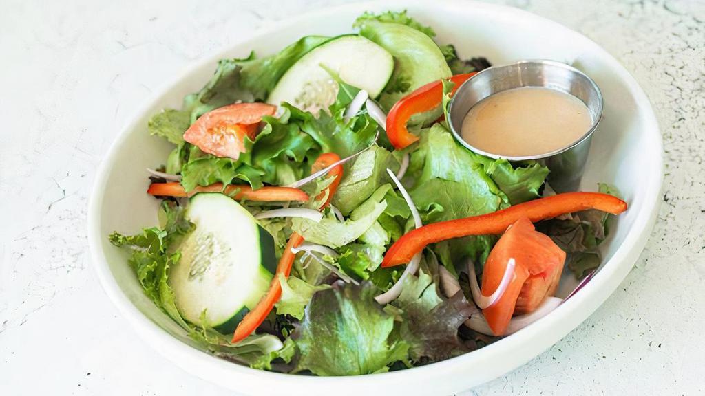 House Salad · Mixed lettuce, cucumber, tomato, red pepper, red onion, and red wine vinaigrette.