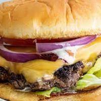 Classic Smash · Smashed 3.5 oz house marinated burger, American Cheese, Lettuce, Onion, Tomato, Drg Sauce on...