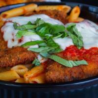 Chicken Parm · Every item is made to order. Served with garlic bread and Parmesan cheese on the pasta.