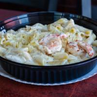 Shrimp Alfredo · Every item is made to order. Served with garlic bread and Parmesan cheese on the pasta.