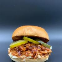 Pull Bbq Chicken · slow cooked shredded chicken marinated  with BBQ sauce that is topped with fresh coleslaw an...