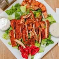 Blackened Chicken Caesar Salad · Blackened grilled chicken over Crisp romaine lettuce, Parmesan cheese, roasted peppers and s...