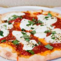 Margherita Pizza · Plum tomatoes, fresh mozzarella,basil and fresh garlic.