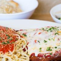 Chicken Parmigiana · Lightly breaded cutlet topped with sauce and mozzarella cheese. Served with soup or salad, s...