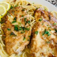 Chicken Francese · Egg batter dipped breast in a white wine lemon butter sauce. Served with soup or salad, side...