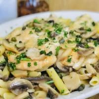 Chicken Piccata · With capers and mushrooms in a white wine lemon butter sauce. Served with soup or salad, sid...