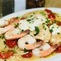 Chicken And Shrimp Sofia · Sautéed chicken and shrimp in garlic and olive oil with chopped tomatoes in a white wine sau...