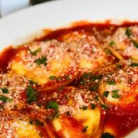 Cheese Ravioli With Sauce · Served with soup or salad, side pasta and garlic knots.