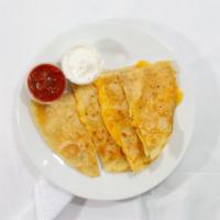 Plain Quesadilla · Grilled peppers onions and tomato on a tortilla shell with cheddar salsa and sour cream.