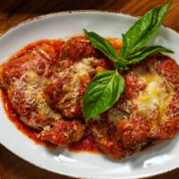 Chicken Parmesan · Chicken cutlet with tomato sauce and mozzarella. Served with spaghetti al pomodoro.
