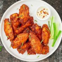 Chix Wings · Fresh chicken wings breaded and fried until golden brown. Served with a side of ranch or ble...