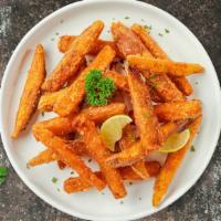 Sweety Potato Fries · Thick-cut sweet potato wedges fried until golden brown.