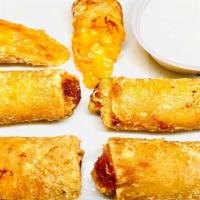 Mini Buffalo Chicken Egg Roll - 5 Pc · 5 pieces of crispy and cheesy buffalo chicken egg roll served with blue cheese