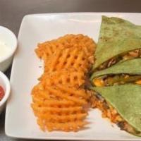 Southwestern Quesadilla · Most popular. Served with chipotle sauce, grilled chicken, sautéed onions, green peppers, fr...