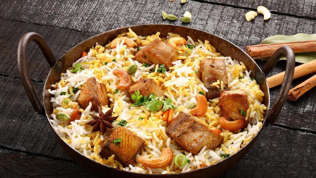 Lamb Mugalai Biryani - ਲੇਲੇ ਮੁਗਲੈ ਬਿਰੀਆਨੀ · Spiced pieces of lamb slow cooked with long grain basmati rice flavored with exotic spices and saffron. Certified halal. Gluten-free.