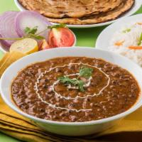 Bukhara Dala Makhani - ਬੁਖਾਰਾ ਡਾਲਾ ਮਖਣੀ · Black lentils and kidney beans slow cooked with chef's special mild spices. Served with basm...