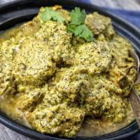 Palak Wala Lamb - ਪਾਲਕ ਵਾਲਾ ਲੇਲਾ · Fresh baby spinach cooked with seasoned succulent pieces of bone less lamb. Served with basm...