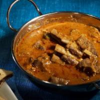 Goat Curry Masaladar - ਬੱਕਰੀ ਕਰੀ ਮਸਾਲੇਦਾਰ · Bone in Baby goat slow cooked in onion, tomato, ginger and garlic sauce with chef's special ...