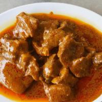 Goat Korma Punjabi - ਬੱਕਰੀ ਕੋਰਮਾ ਪੰਜਾਬੀ · Bone in Goat cooked in chef's special spiced sauce made with yogurt. Served with basmati ric...