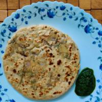 Methi Paratha · Spiced fresh fenugreek leaves stuffed whole wheat bread made on skillet.
