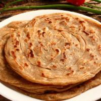 Bebe Da Paratha ( Plain ) - ਸਦਾ ਪਰਥਾ (ਸਾਦਾ) · Hand rolled whole wheat bread made on skillet