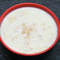 Kheer · Saffron and cardamom flavored rice pudding.