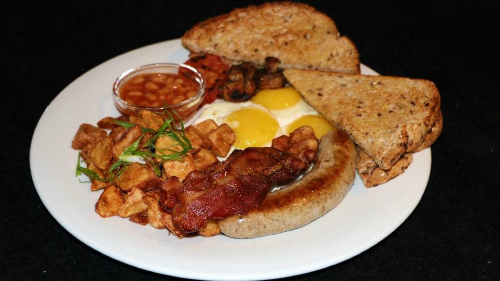 Full English Breakfast · Three eggs, house made British banger, bacon, grilled mushrooms, grilled tomato, baked beans, breakfast potatoes and multi-grain toast.