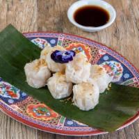 Shrimp Shumai · A Steam or Fried dumpling that contains a shrimp, ginger and onion served with ginger sauce.