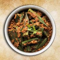 Curried Okra Masala · Okra cooked in a spiced tangy base of onions, tomatoes and ground spices.