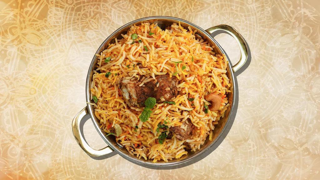 Jumbo Goat Biryani · Long grained rice flavored with fragrant spices flavored along with saffron and layered with goat and cooked with biryani masala gravy (serves 7 people)