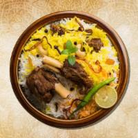Jumbo Lamb Biryani · Long grained rice flavored with fragrant spices flavored along with saffron and layered with...