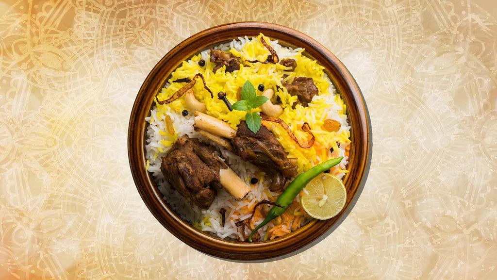 Jumbo Lamb Biryani · Long grained rice flavored with fragrant spices flavored along with saffron and layered with lamb and cooked with biryani masala gravy(serves 7 people)