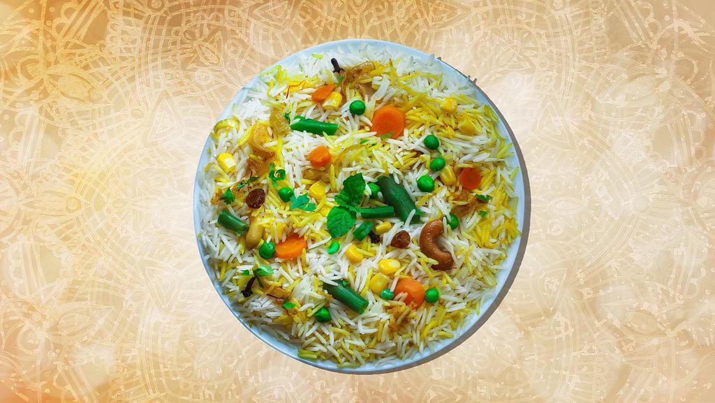 Jumbo Veggie Biryani · Long grained rice flavored with fragrant spices flavored along with saffron and layered with vegetables and cooked with biryani masala gravy (serves 7 people)