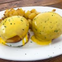 Donut Benny · Poached egg inside of a mini donut! Topped with homemade hollandaise sauce
