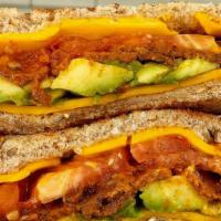 Vegan Avocado Blt · Avocado, lettuce, tomatoes and vegan bacon on multigrain bread. Served with french fries or ...