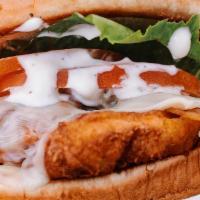 Vegan Chicken Bacon Ranch · Seitan chicken seasoned and prepared in house topped with smoked bacon. Served with lettuce,...