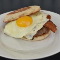 The Hangover Burger Sandwich · 8oz burger topped with bacon, cheese and an overeasy egg. Served on Jumbo English muffin wit...