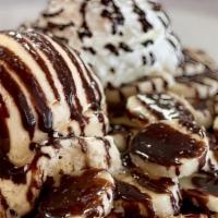 Banana Split Waffle · Banana, ice cream, chocolate drizzle and whipped cream