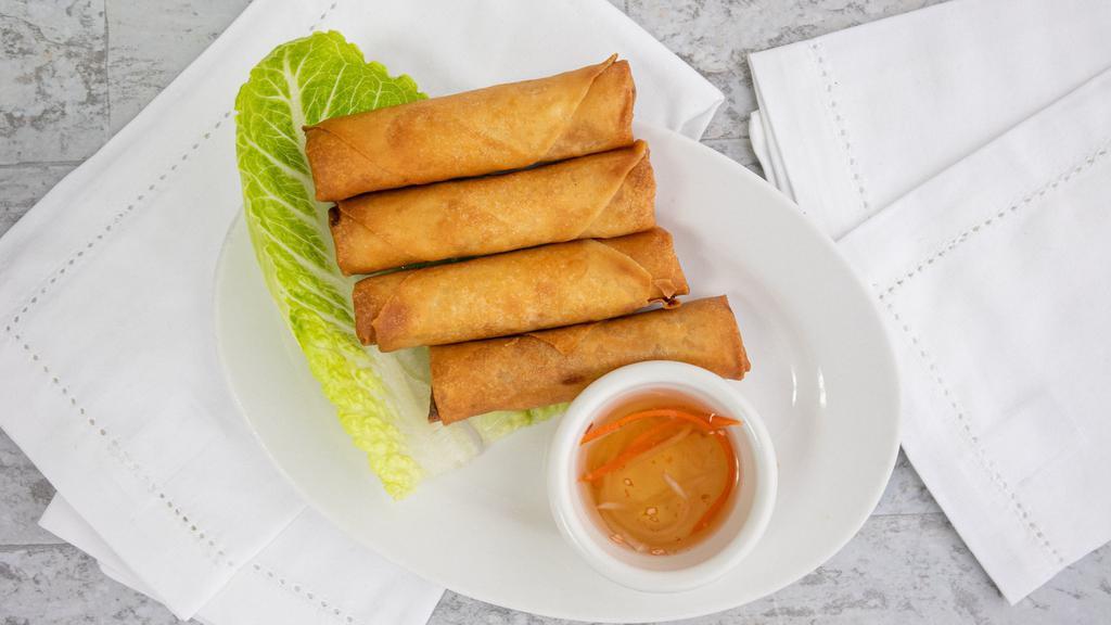 Egg Rolls (4 Rolls) · Crispy, fried Vietnamese egg roll with ground pork carrots, taro, jicama, and glass noodles wrapped in wonton paper served with garlic fish sauce.
