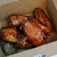 6Pc Wings - Peach Bourbon Bbq · Our house made Sweet & tangy BBQ straight from the Bourbon drums of Kentucky.