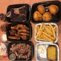 The Two Step (Serves 2) · 1/2 lb pulled pork, 6 pieces pork ribs, 8 chicken wings, 8oz cole slaw, french fries, cornbr...