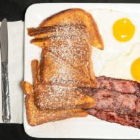 French Toast Combo · Served with two eggs (no toast or home fries) choice of bacon or sausage or scrapple or ham.