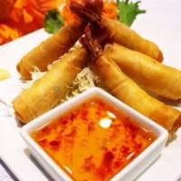 Shrimp Bikini · Shrimp wrapped in rice paper, deep-fried and served with sweet and sour sauce