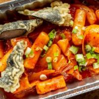 Tteokbokki · Soft rice cakes and vegetables, cooked in sweet red chili sauce. Includes a fried kimmari se...
