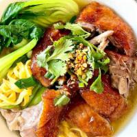 Mee Theah Kvai · Egg noodle, roasted duck, bean sprout, cilantro, scallion, in house broth.