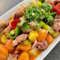 Cha Pork Rib Chou Aem · Stir-fried sweet and sour pork rib, tomato, pineapple chunk, red bell pepper.